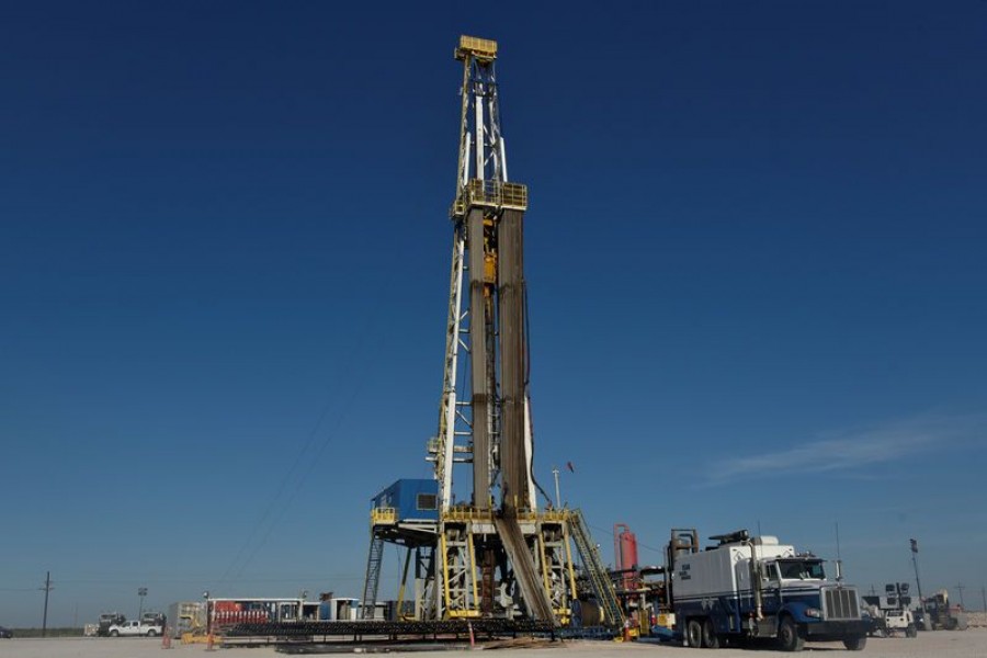 A drilling rig on a lease owned by Oasis Petroleum performs logging operations in the Permian Basin oil and natural gas producing area near Wink, Texas, US, August 22, 2018. Reuters/File Photo