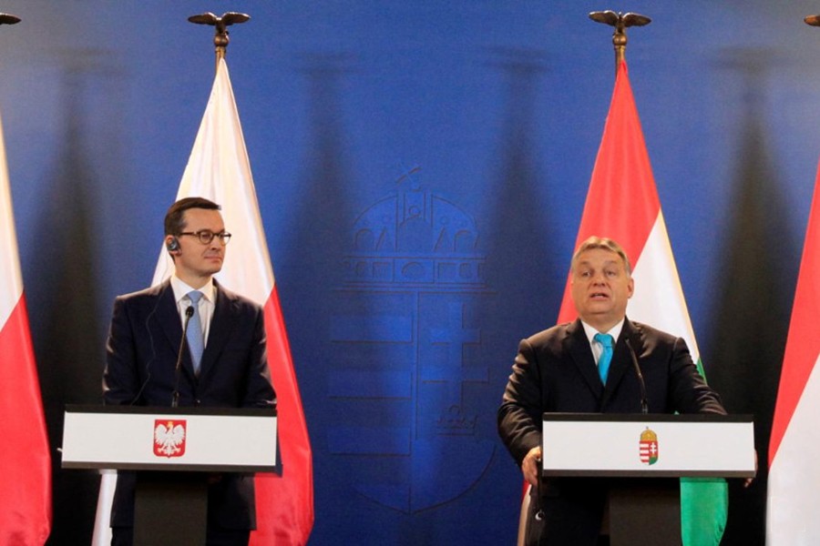 Polish Prime Minister Mateusz Morawiecki (left) and Hungarian Prime Minister Viktor Orban hold a joint news conference in Budapest, Hungary on January 3, 2018 — Reuters/File