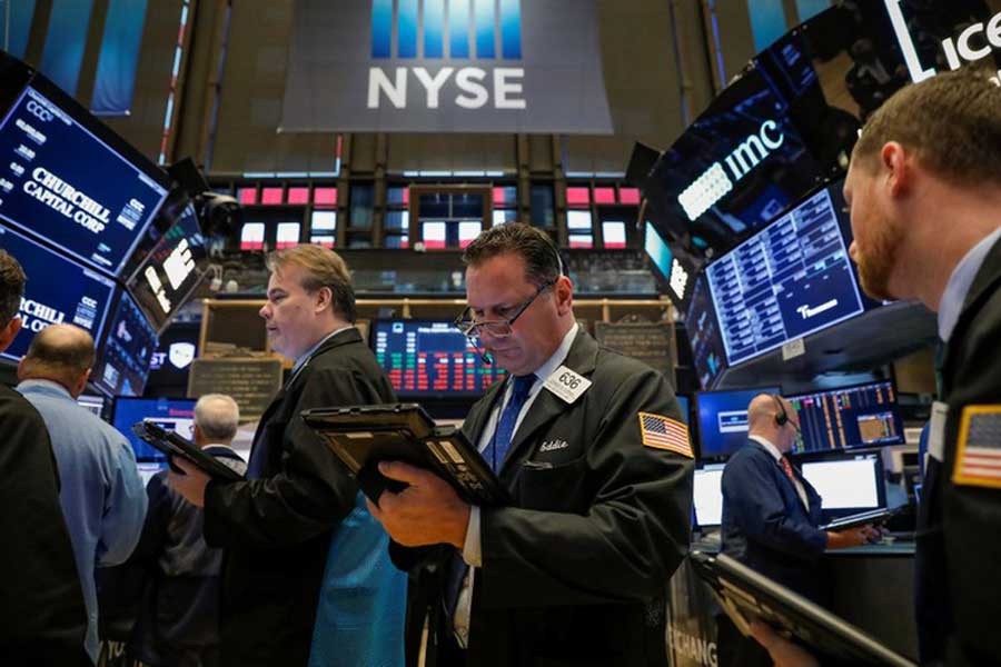 Traders work on the floor of the New York Stock Exchange (NYSE) in New York, US, September 7, 2018. Reuters