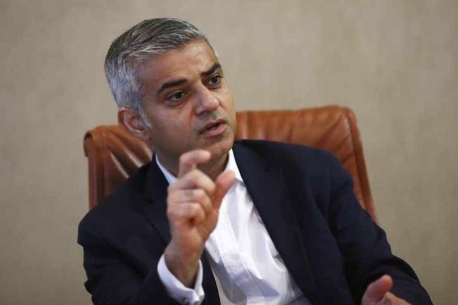 London mayor Sadiq Khan gestures during an interview with Reuters during an interview with Reuters at Canary Wharf in London, Britain November 17, 2015