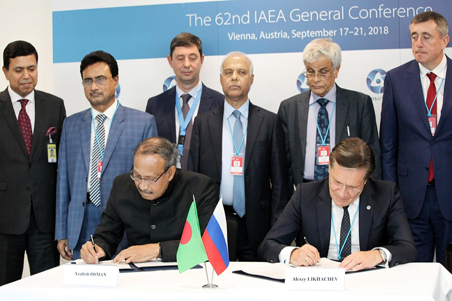 Bangladesh’s Minister for Science and Technology Yeafesh Osman (L) and Russia’s Rosatom State Atomic Energy Corporation Director General Alexey Likhachev signing the protocol on behalf of their respective governments