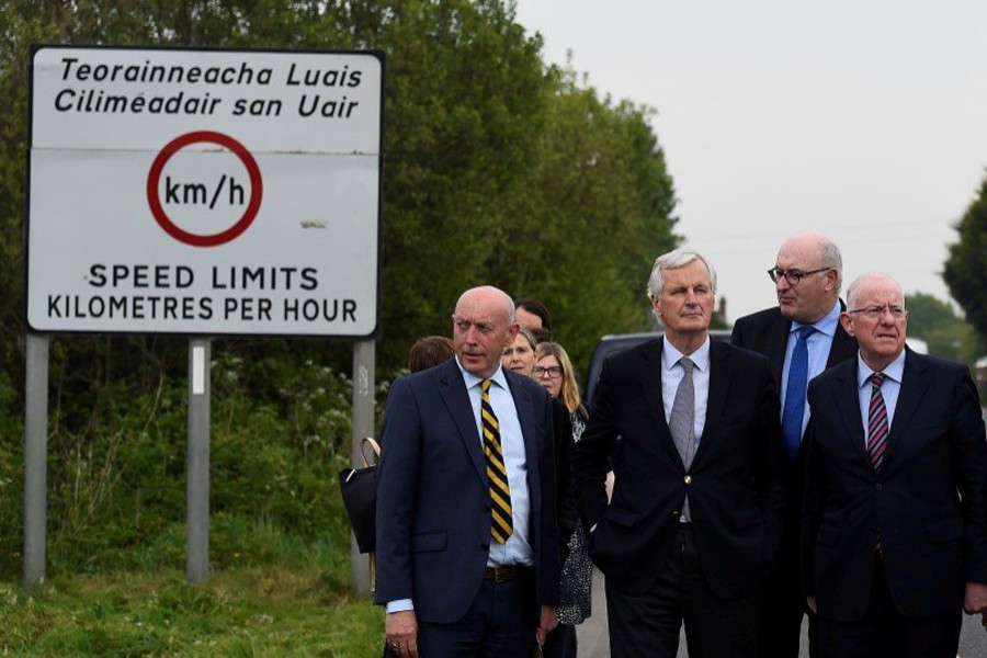 European Union Chief Negotiator for Brexit Michel Barnier accompanied by a delegation of Irish ministers visits the Armagh and County Louth border between Northern Ireland and Ireland May 12, 2017. Reuters/File photo