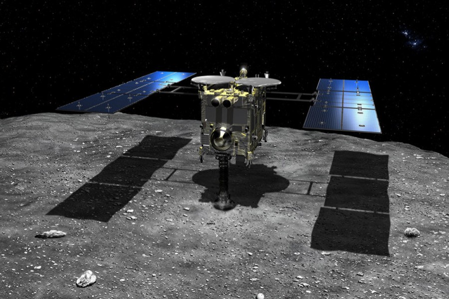 The image depicts space exploration probe Hayabusa 2 landing on the surface of the asteroid Ryugu. Picture (collected)