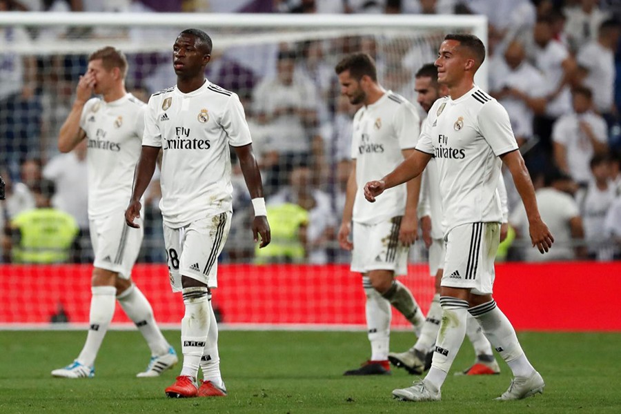 Real Madrid players look dejected as the clash against Atletico Madrid ends in goalless stalemate — Reuters photo