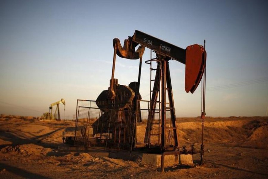 A pump jack is seen at sunrise near Bakersfield, California, October 14, 2014. Reuters/Files