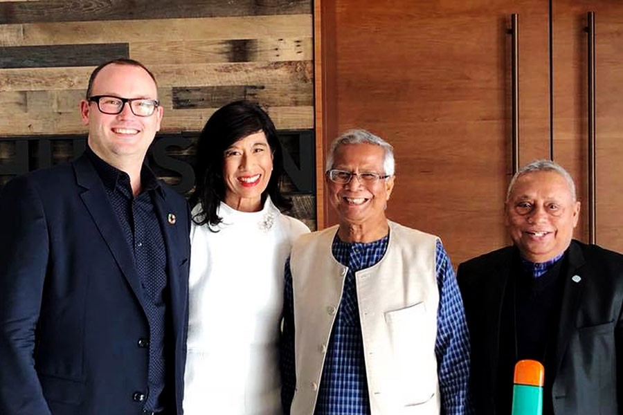 Nobel Laureate Professor Muhammad Yunus, along with Grameen America President and CEO Andrea Jung (second from left), posing for a photograph at New York in USA recently.