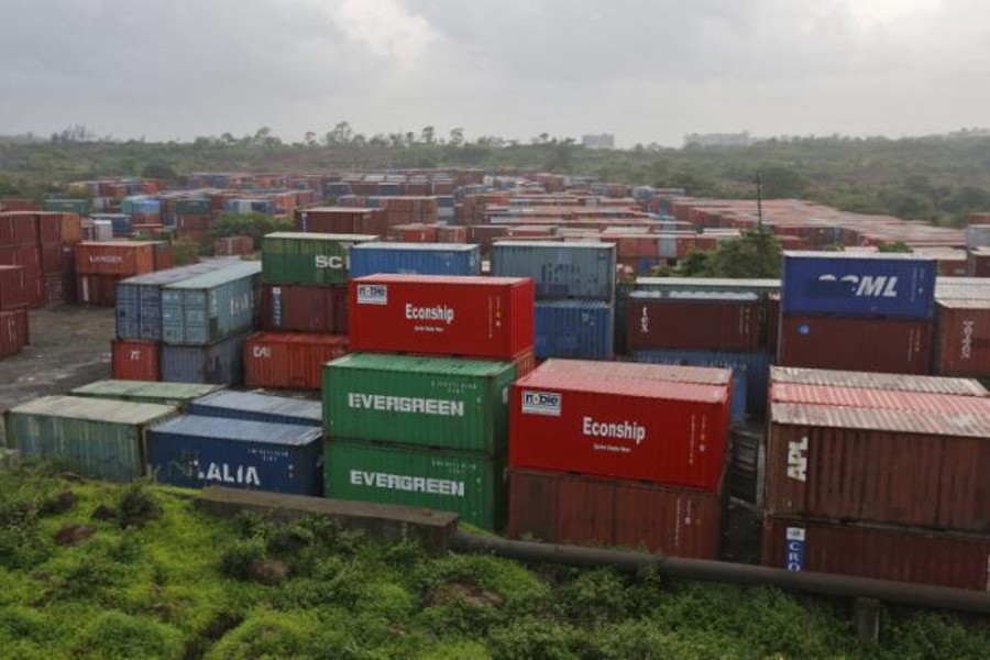 Cargo containers are seen stacked outside the container terminal of Jawaharlal Nehru Port Trust (JNPT) in Mumbai, India, July 15, 2015. Reuters/File Photo