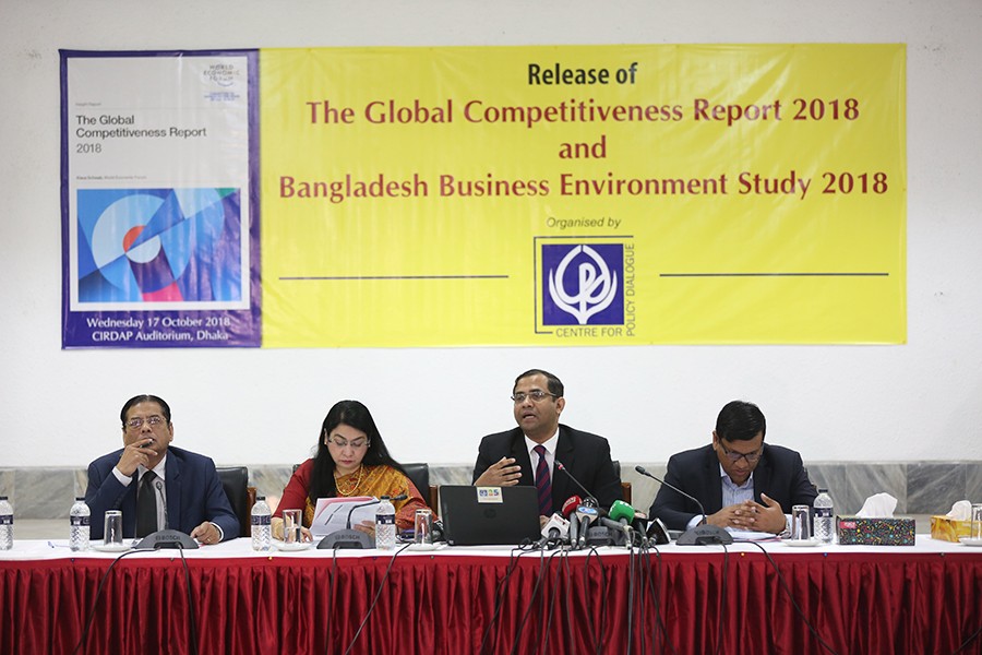 CPD Research Director Dr Khondaker Golam Moazzem addressing a function to release "The Global Competitiveness Report 2018" and "Bangladesh Business Environment Study 2018," organised by CPD at CIRDAP auditorium in the city on Wednesday — FE photo