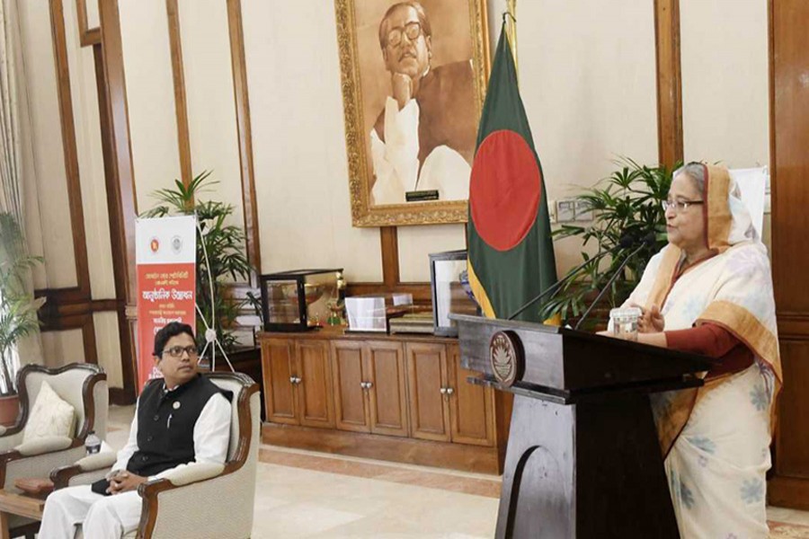 Prime Minister Sheikh Hasina speaks at the inauguration event of the mobile number portability service at Ganobhaban on Sunday. Photo: PMO