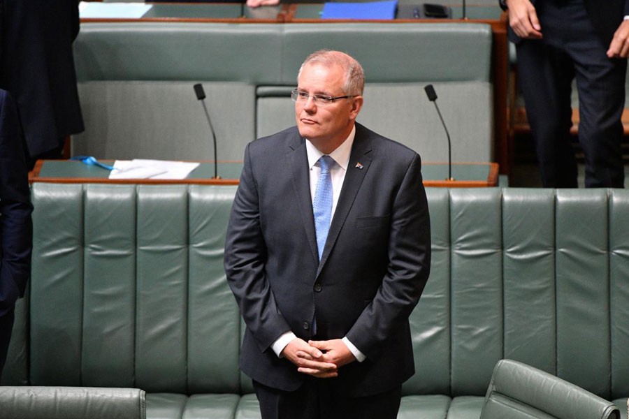 Australia's Prime Minister Scott Morrison stands before delivering the National Apology to survivors of child sexual abuse in the House of Representatives at Parliament House in Canberra, Australia, October 22, 2018 - AAP/Mick Tsikas/via Reuters