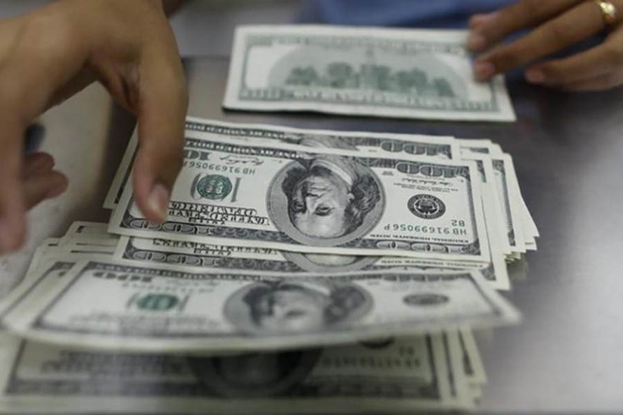 Dollar holds near 10-week high