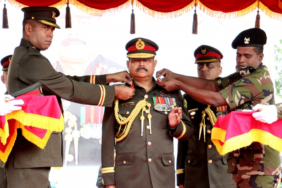 Senior Superintendent of Armoured Corps and Senior Subedar Major adorning Chief of Army Staff General Aziz Ahmed with the rank badge of 'Colonel Commandant' of the Armoured Corps known as the 'King of the Battle' at Bogura Cantonment on Monday	— ISPR