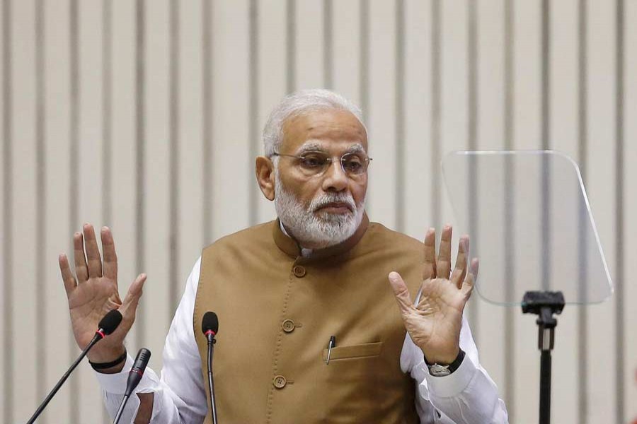 India's Prime Minister Narendra Modi gestures as he addresses the gathering during the 'Global Mobility Summit' in New Delhi, September 7, 2018. Reuters/File Photo