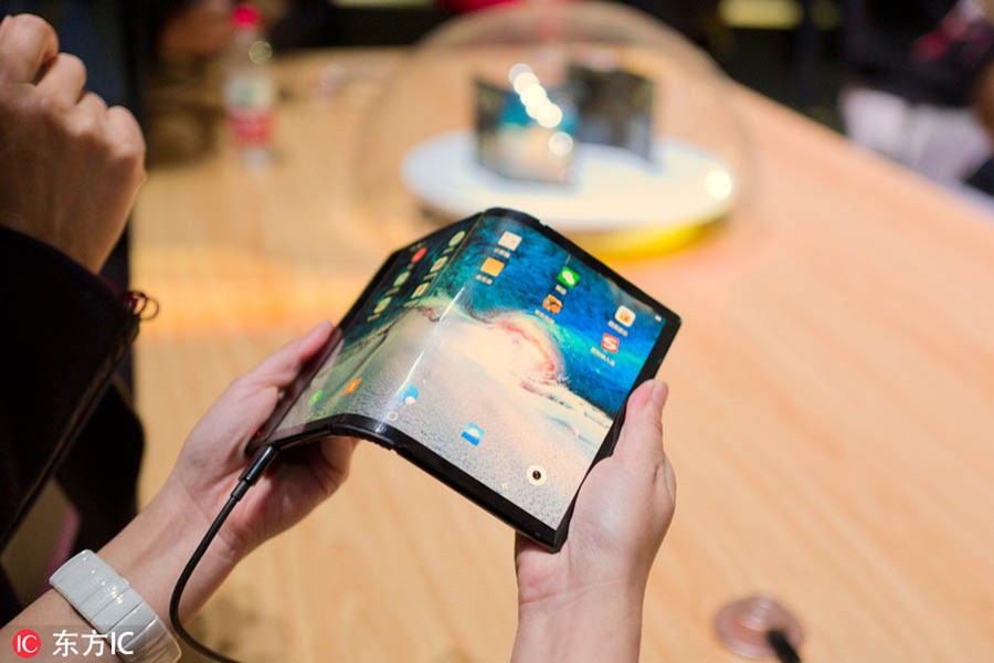 Royole Corp unveils a large-screen foldable device, FlexPai on Oct 31. Photo: Collected