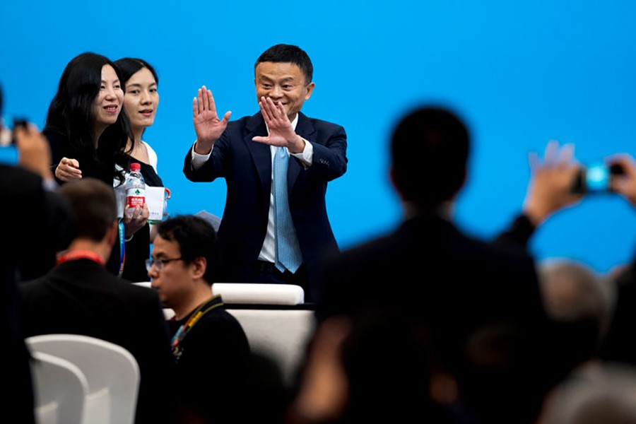 Jack Ma, CEO of Alibaba, arriving for a forum of the first China International Import Expo (CIIE) in Shanghai on Monday. -Reuters Photo