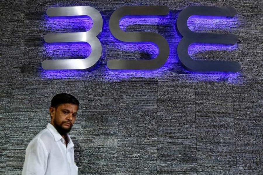A man walks out of the Bombay Stock Exchange (BSE) building in Mumbai, India June 20, 2016. Reuters/File Photo