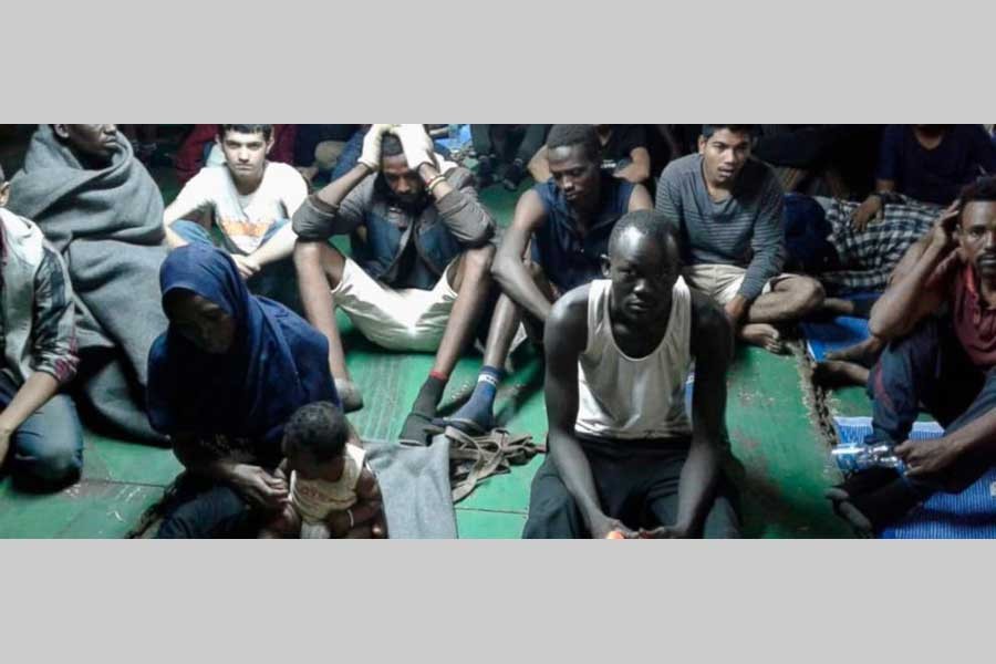 In this photo provided Nov 14, 2018, migrants on board the container ship Nivin are refusing to disembark in Misrata, Libya. A total of 91 migrants, including a baby, were rescued by the ship’s crew last weekend after leaving Libya in a raft. - AP photo