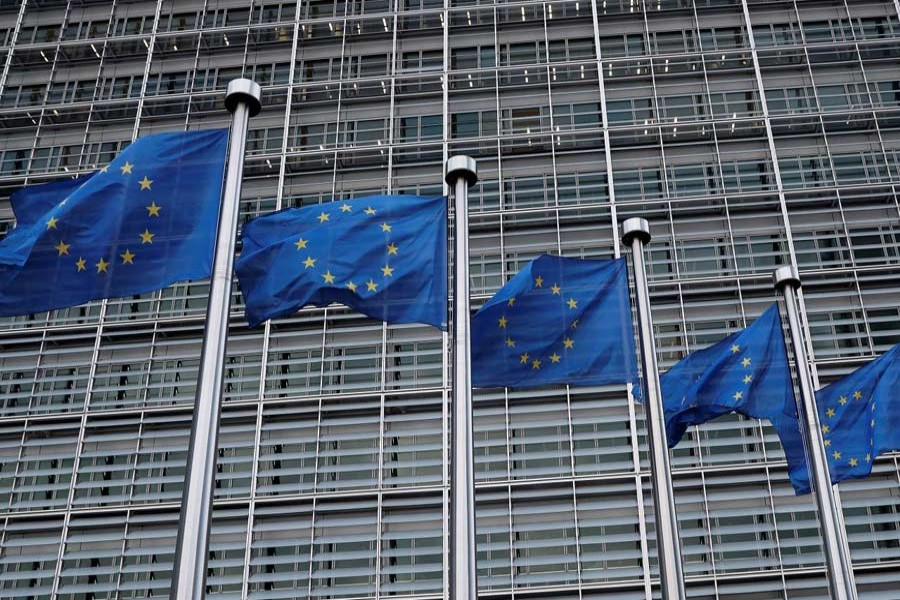 European Union flags flutter outside the EU Commission headquarters in Brussels, Belgium, March 8, 2018. Reuters/File Photo