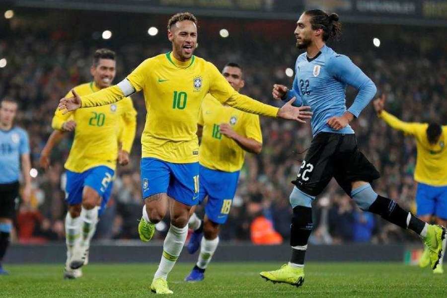 Brazil's Neymar celebrates scoring their first goal from the penalty spot - Action Images via Reuters