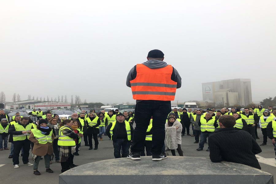 French protesters block road over hiked fuel tax, one dies