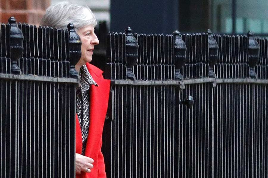 Britain's Prime Minister Theresa May leaves 10 Downing Street via the back exit in London, Britain, November 16, 2018. Reuters