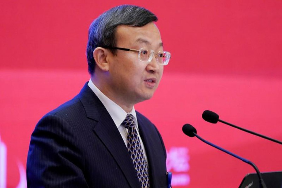 Chinese Vice Commerce Minister and Deputy China International Trade Representative Wang Shouwen speaks at the annual session of China Development Forum (CDF) 2018 at the Diaoyutai State Guesthouse in Beijing, China March 25, 2018. Reuters/File Photo