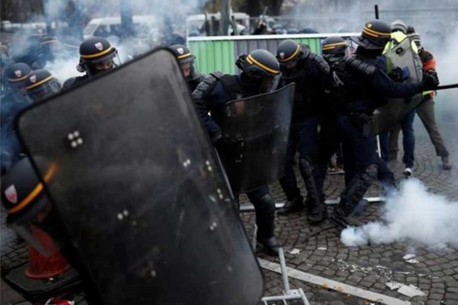 French police use tear gas to disperse fuel protesters