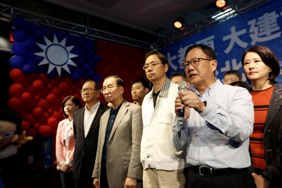 Taiwan's opposition Nationalist Kuomintang Party (KMT) Taipei mayoral candidate Ting Shou-chung announces he will file a suit regarding the election result in Taipei, Taiwan, November 25, 2018. Reuters