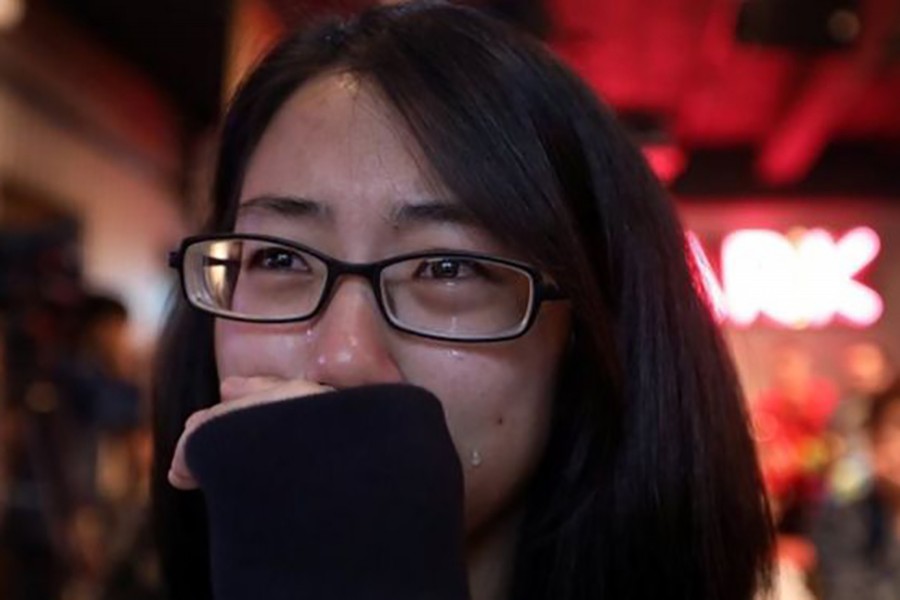 A same-sex marriage supporter in Taiwan cries after Saturday's referendums in Taiwan. Photo: Reuters