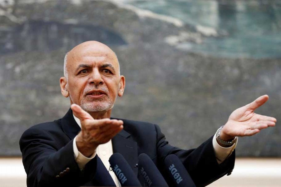 Afghan president forms team to negotiate peace with Taliban