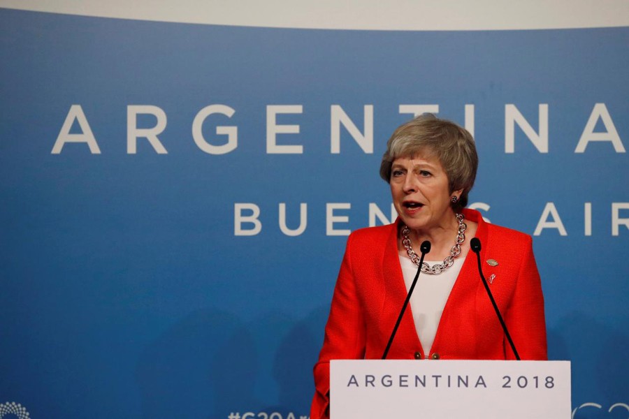 Britain's Prime Minister Theresa May addresses the media during the G20 Leaders Summit in Buenos Aires, Argentina, December 1, 2018. Reuters