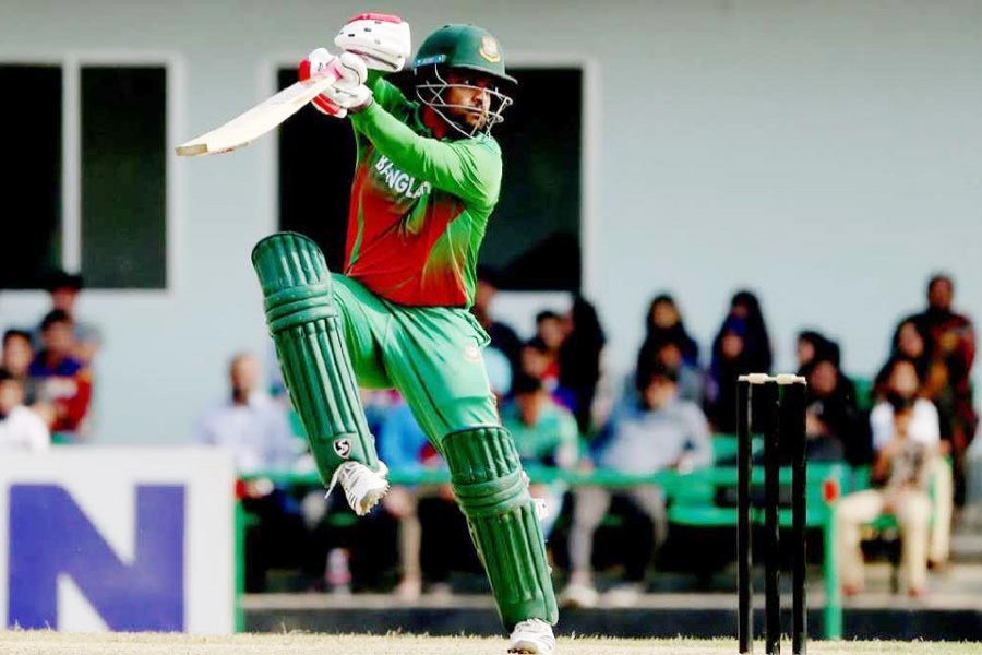 Tamin Iqbal hitting the ball against a West Indies bowler during the prequel match to the three-match one-day International series at BKSP in Savar on Thursday 	— UNB