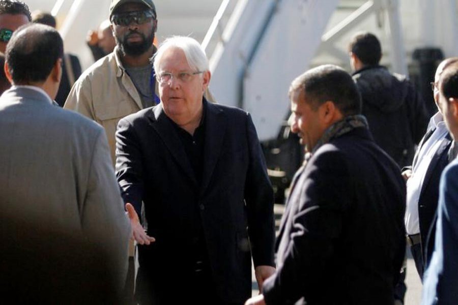 STOCKHOLM: UN envoy Martin Griffiths (centre) accompanying the Houthi delegation for talks 	— Reuters