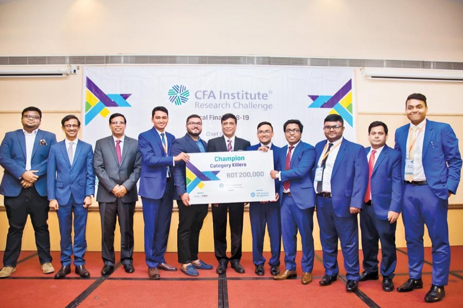 Prof Khairul Hossain, chairman of the Bangladesh Securities and Exchange Commission handing over the dummy cheque to the winning team of a competition, arranged by CFA Society Bangladesh. Arif Khan, CEO and managing director of IDLC Finance, Shahidul Islam, President of CFA Society Bangladesh, Neil Govier, Director of CPD and CFA Institute and K.A.M. Majedur Rahman, managing director of Dhaka Stock Exchange also attended.