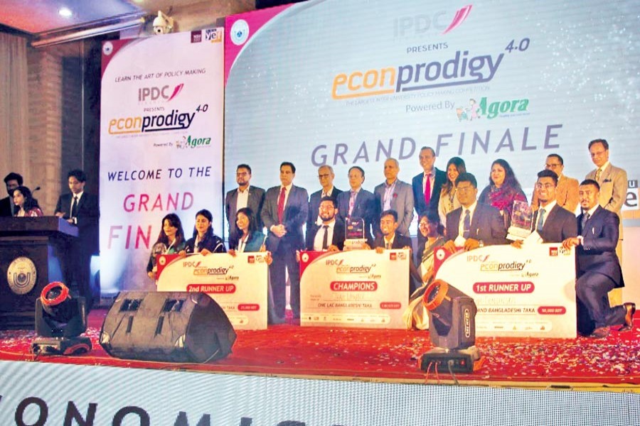 The awardees with the judges, chief guests and others during the grand finale of this year's EconProdigy organised by Young Economists' Forum (YEF) of North South University