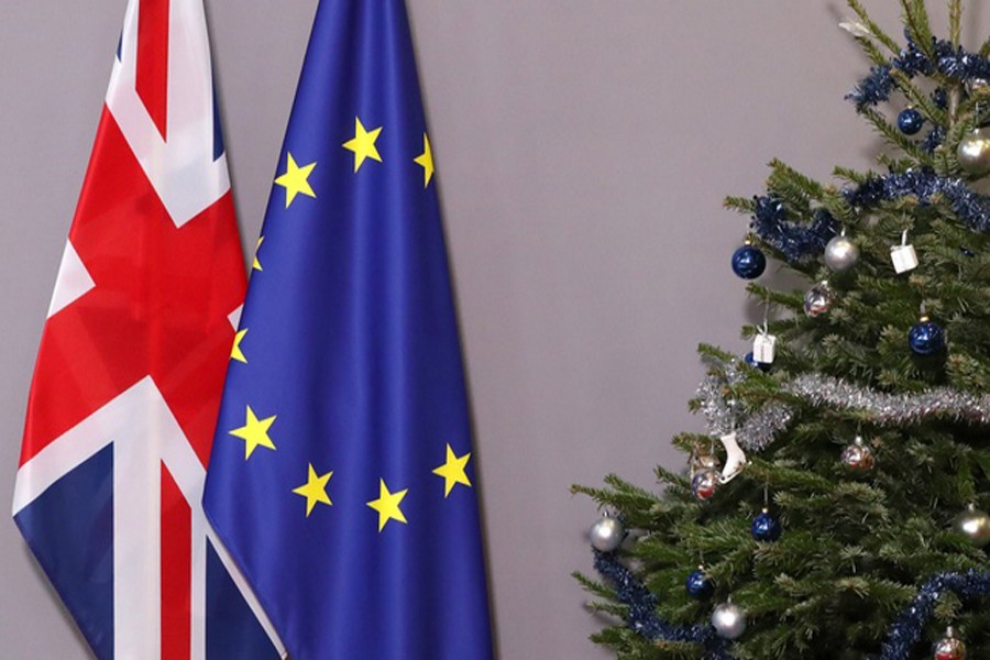 British and European Union flags are seen next to Christmas tree before arrival of British Prime Minister Theresa May to meet European Council President Donald Tusk, at the EU Council headquarters in Brussels, Belgium December 11, 2018. Reuters