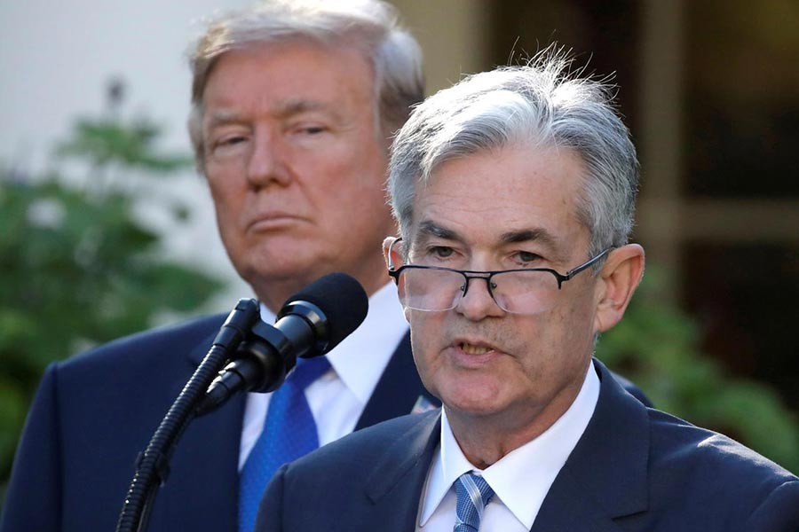 US President Donald Trump and US Federal Reserve Chairman Jerome Powell. -Reuters file photo