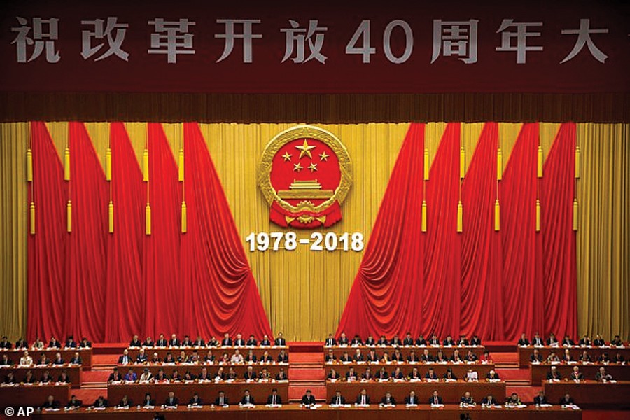 Chinese President Xi Jinping, bottom row centre, speaks during a conference to commemorate the 40th anniversary of China's Reform and Opening Up policy at the Great Hall of the People in Beijing on December 18, 2018.  —Photo: AP   