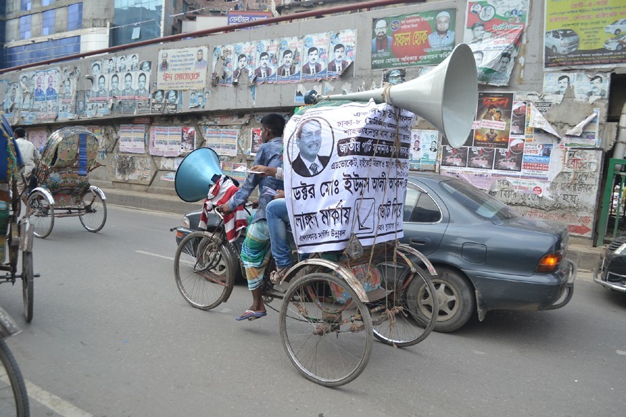 Loudspeakers are being widely used during campaigning for the forthcoming election. This photograph was taken from Shantinagar in the city on Saturday — FE photo