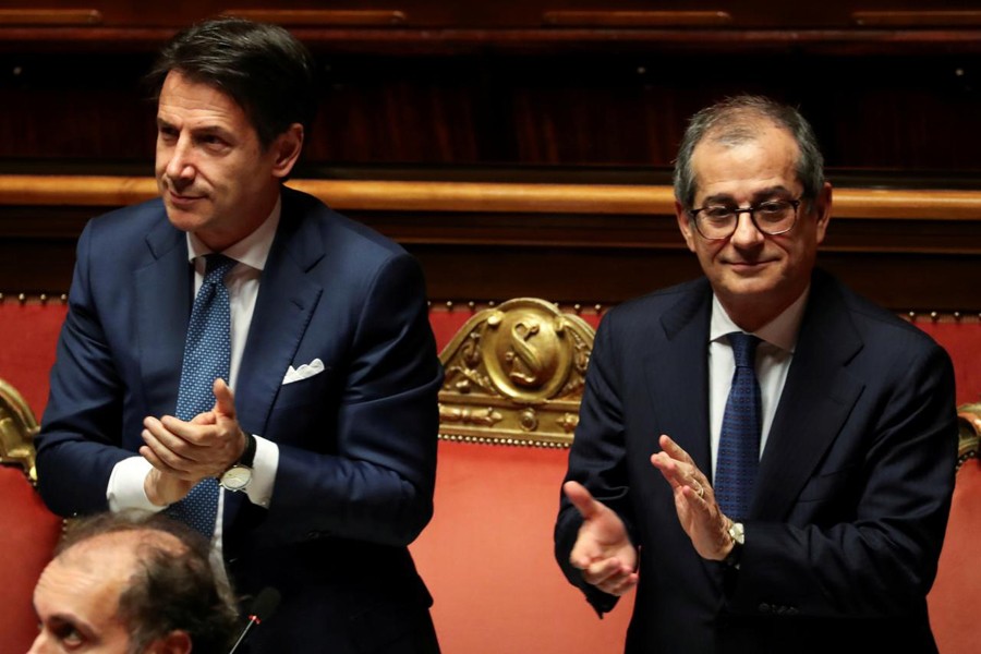 Italian Prime Minister Giuseppe Conte and Italian Economy Minister Giovanni Tria attend a debate at the Senate in Rome, Italy, December 19, 2018. Reuters/File Photo