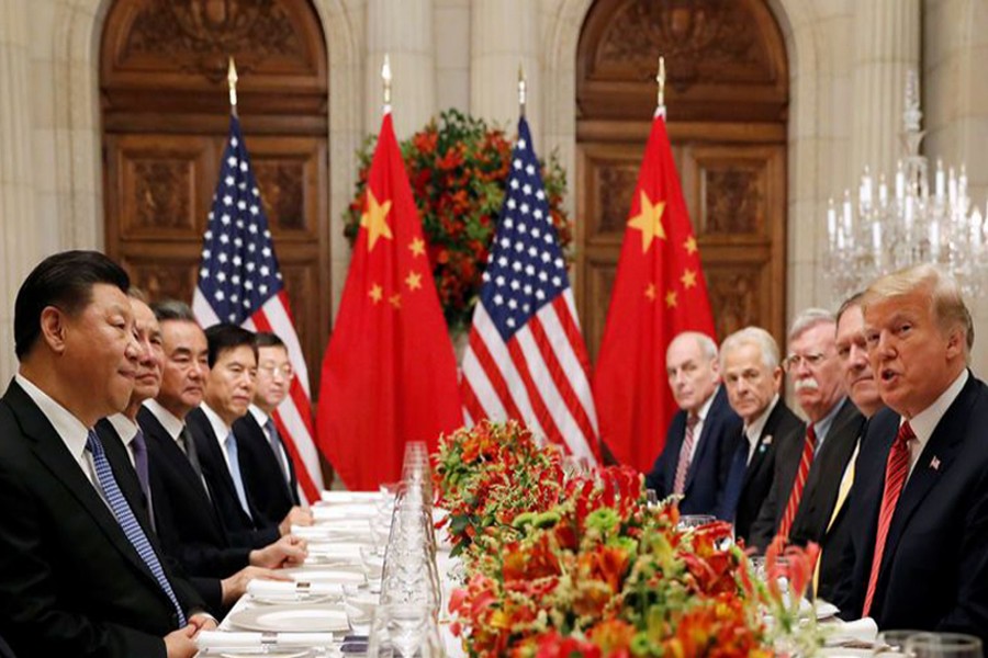 US President Donald Trump, US Secretary of State Mike Pompeo, US President Donald Trump's national security adviser John Bolton and Chinese President Xi Jinping at a working dinner after the G20 leaders summit in Buenos Aires on December 1, 2018. Reuters/Files