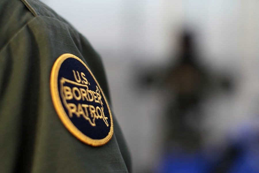 A logo patch is shown on the uniform of a US Border Patrol agent near the international border between Mexico and the United States south of San Diego, California on March 26, 2013 — Reuters/File