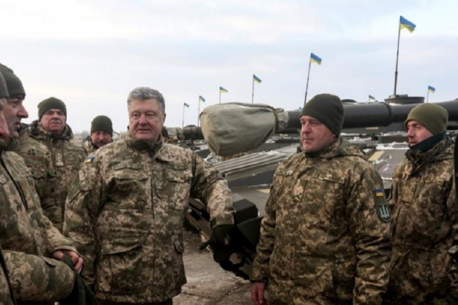 Ukraine's President Petro Poroshenko (3rd R) attends a ceremony to hand over weapons and military vehicles to servicemen of the Ukrainian armed forces at an airforce base near Zhytomyr, Ukraine on December 21, 2018.  - Reuters