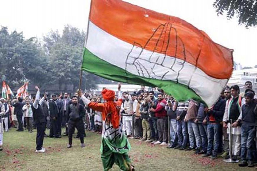 Assembly Elections 2018: Supporters of Congress party celebrate on December 11, 2018 at the party headquarters in New Delhi. 	— Photo courtesy: Indian Express