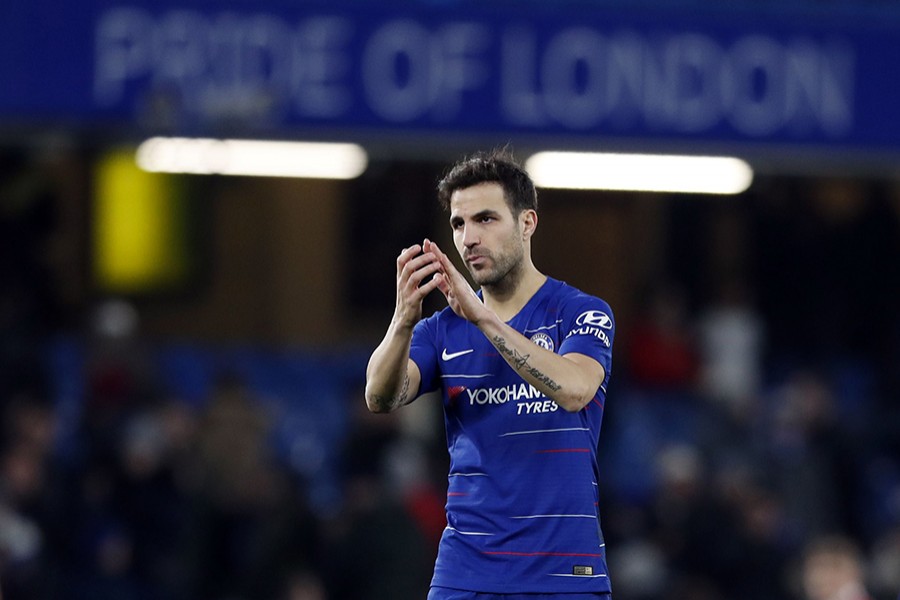 Chelsea’s Cesc Fabregas applauds the supporters at the end of the English FA Cup third round football match against Nottingham Forest at the Stamford Bridge in London on Saturday — AP photo