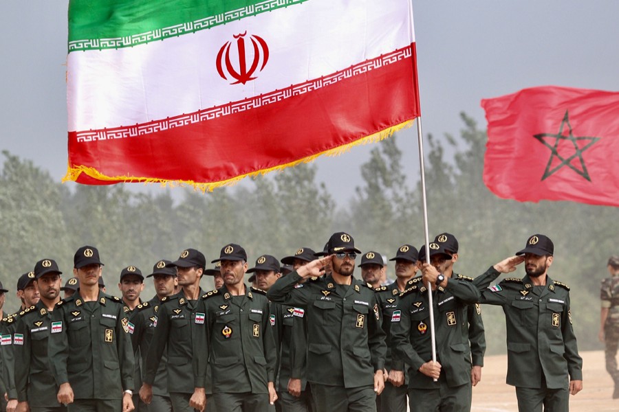 Iran's army servicemen with the national flag attend the opening ceremony of the airborne platoon competition, part of the International Army Games 2017, in Guangshui, Hubei province, China, July 30, 2017. China Daily via Reuters