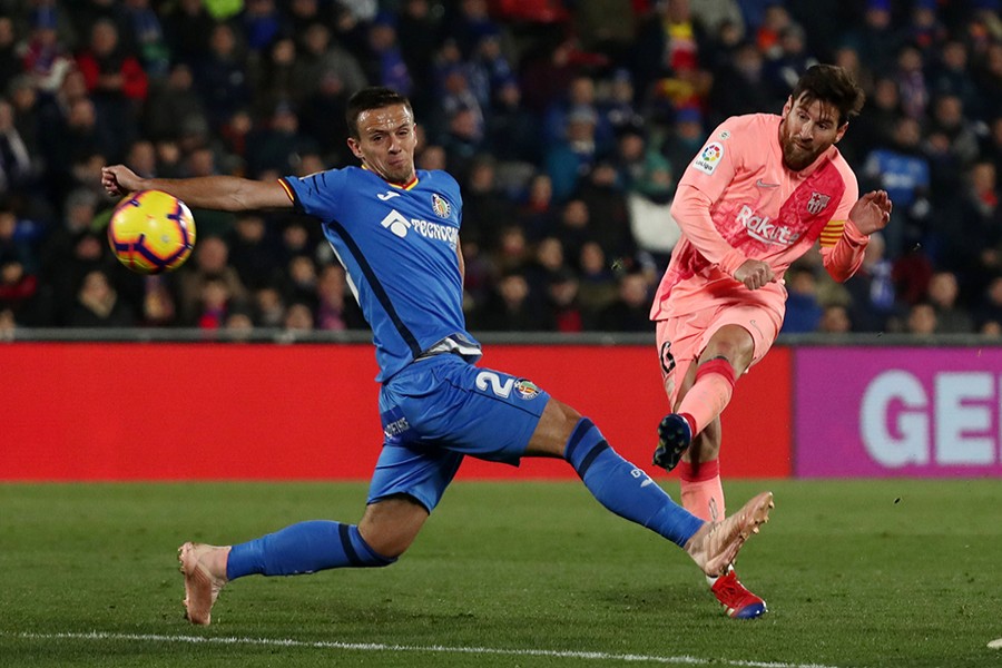 Barcelona's Lionel Messi shoots at goal in the clash against Getafe on Sunday — Reuters photo