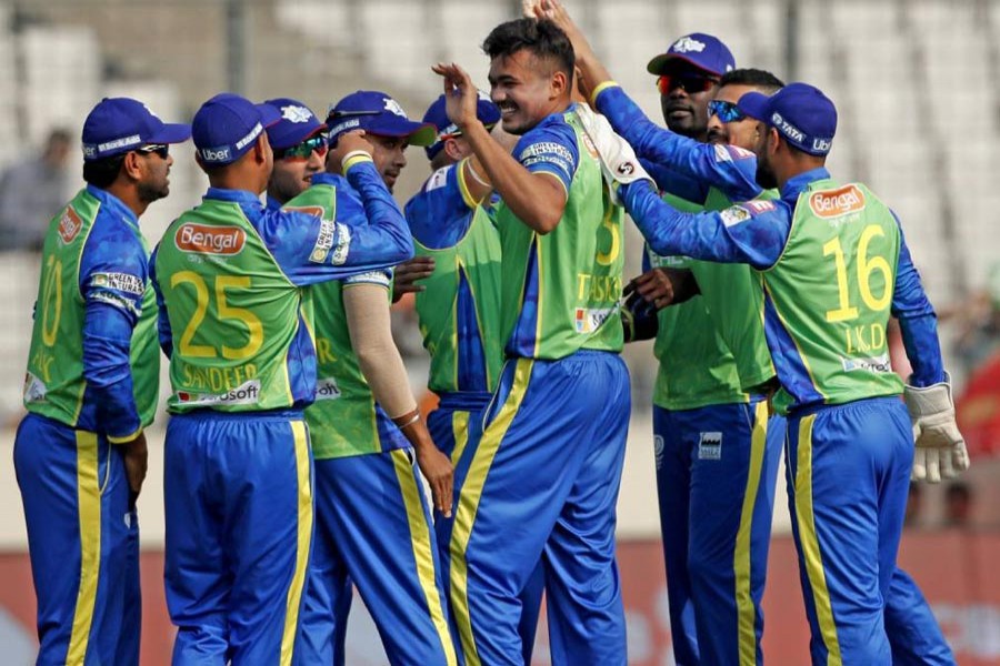 Sylhet Sixers' Taskin Ahmed celebrating with teammates after taking a wicket against Chittagong Vikings during the BPL at Sher-e-Bangla National Cricket Stadium in the city on Wednesday	— UNB