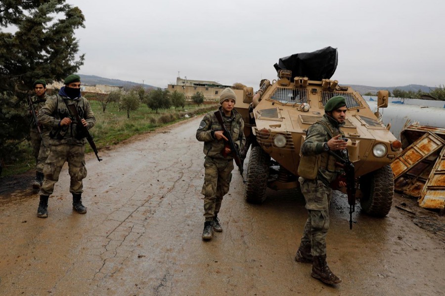 Representational image: Members of Turkey-backed Free Syrian Army police forces secure the road as they escort a convoy near Azaz, Syria January 26, 2018. Reuters/Files