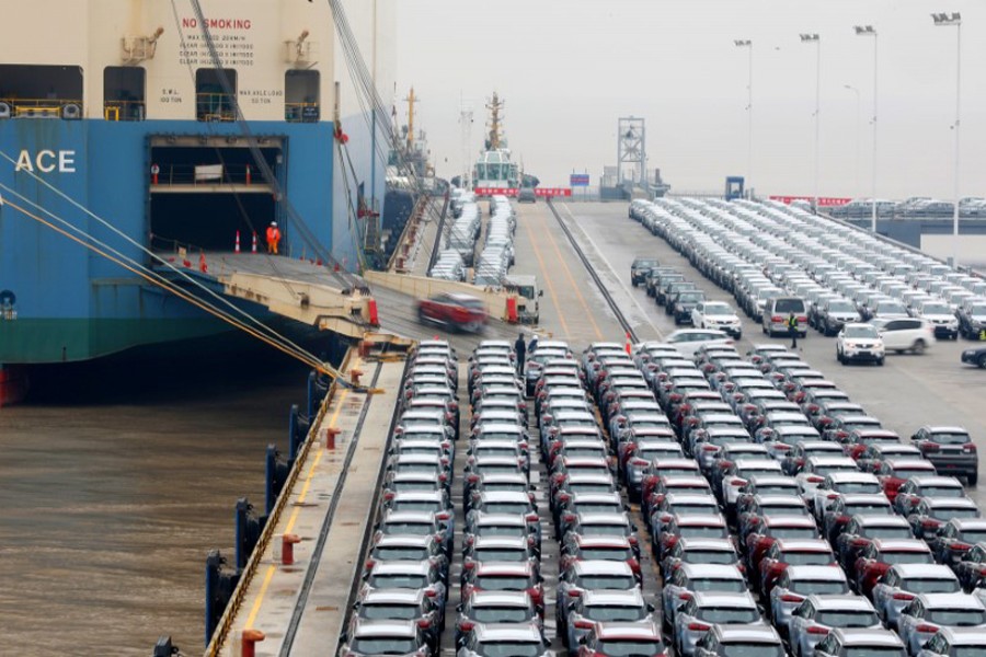 Geely cars for export enter a cargo vessel at Ningbo Zhoushan port in Zhejiang province, China January 2, 2019. Reuters